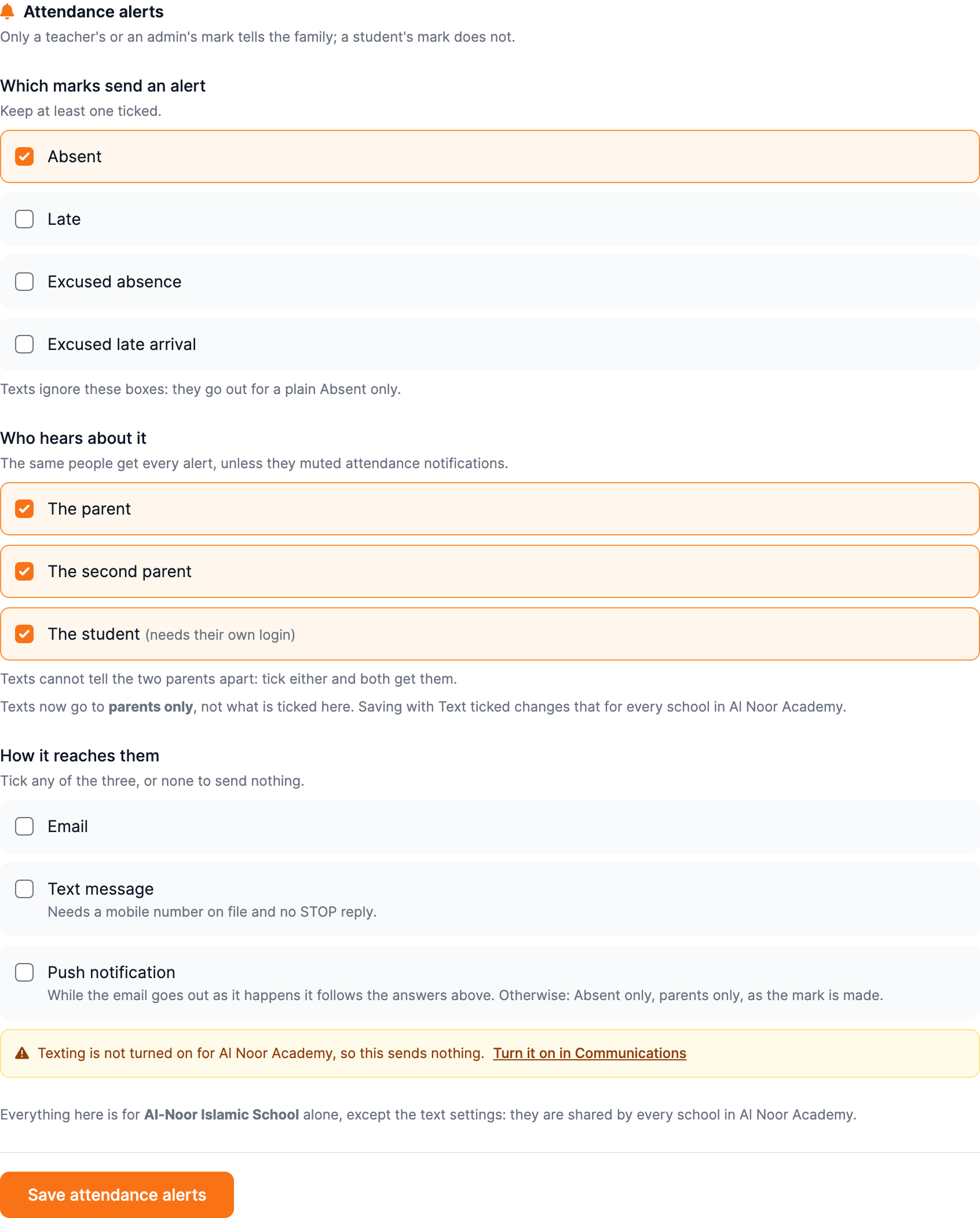 The 'Attendance alerts' card in Settings → Attendance: a 'Which marks send an alert' group with Absent, Late, Excused absence and Excused late arrival checkboxes, a 'Who hears about it' group with The parent, The second parent and The student, a 'How it reaches them' group with three independent checkboxes — Email, Text message and Push notification — a 'When should the alerts fire?' group offering At the end of the day or a number of minutes after the mark, and a single orange Save attendance alerts button.